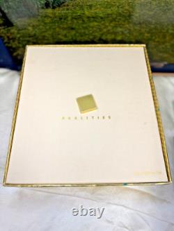 Realities 100ml Edt Spray, 200ml Body Lotion, 43g Dusting Powder, 3.7ml Perfume