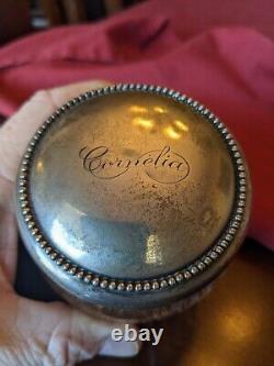 Vintage powder and perfume sterling lids